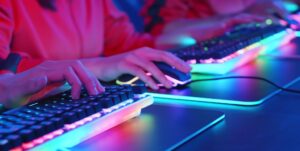 close up of cyber sport gamers team play game while clicking the mouse and keyboard